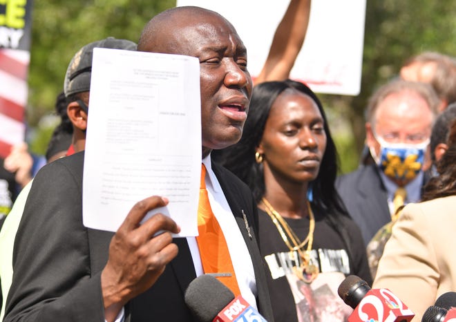 Civil rights attorney Benjamin Crump, accompanied by attorney Natalie Jackson and the families of  A.J. Crooms, 16, and Sincere Pierce, 18,  held a press conference on the lawn of the Moore Justice Center in Viera announcing a lawsuit filed Thursday night April 22, 2021, against Deputy Jafet Santiago-Miranda and the Brevard County Sheriff's Office. Pierce and Crooms were shot and  killed in a traffic stop in November. Crump and his counselor Steven Hart, along with Jackson, represent the families of the two Cocoa teens.