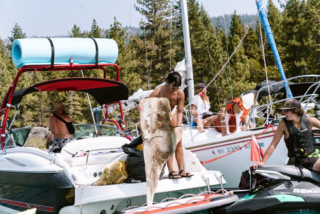 Crews cleaning up Lake Tahoe at a previous, smaller-scale event.