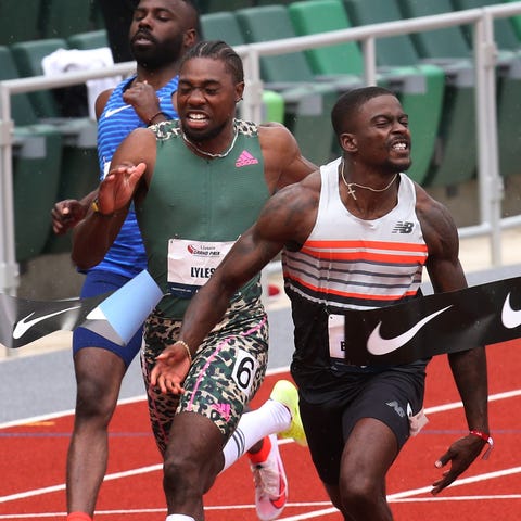 Trayvon Bromell, right, wins the Men's 100 meters 