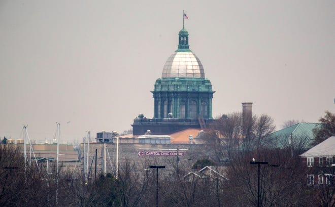 The Manitowoc County courthouse rises above the horizon as seen, Saturday, April 24, 2021, in Manitowoc, Wis.