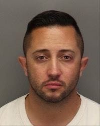 Fabian Herrera, 36, a bail agent who shot and killed a Palm Springs man early Friday, has been arrested after authorities say Herrera broke into the man's home and should not have been in possession of firearms due to his criminal background.