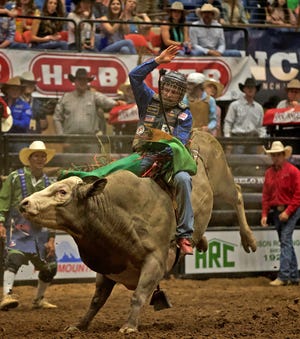 Josh Frost competes in the bull riding event during the Cinch Chute-Out at the San Angelo Rodeo on Saturday, April 24, 2021.