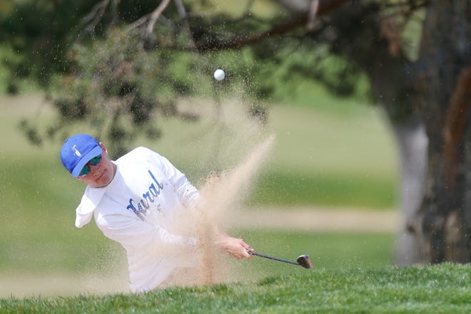 Washburn Rural's Luke Leonetti chips out of the sand on No. 9 at Topeka Country Club during Monday's City Golf Championship. Leonetti captured his first city title, shooting a 114 over 27 holes to win by eight strokes and lead Washburn Rural to its 11th straight city crown.
