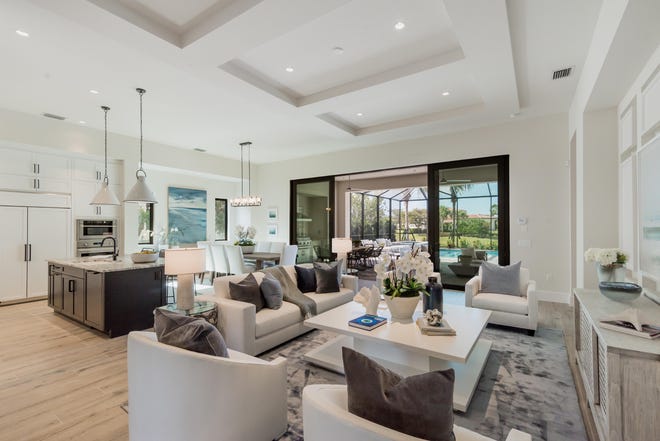 The Devonshire is an entertaining oasis, with a formal dining room and a generous great room that opens to an outdoor living space complete with a kitchen, pool and spa.