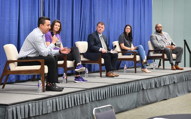 Cody Magana of White Realty talks about overcoming adversity in a panel discussion during the Business Owners Sharing Solutions (BOSS) event sponsored by the Wichita Falls Chamber of Commerce Tuesday at the Ray Clymer Exhibit Hall.