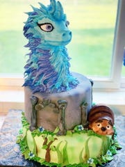 The Times Recorder's Raya and the Last Dragon cake by Shala Aitken will be up for bids at 5:45 p.m. Wednesday.