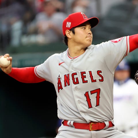 Shohei Ohtani delivers a pitch the first inning ag