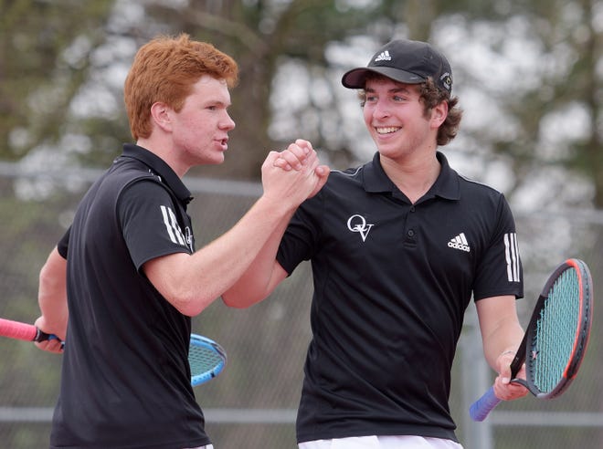 Quaker Valley's Henry Veeck, left, and Michael Lipton react after winning a game against Winchester Thurston during the Class AA doubles championship Wednesday, at North Allegheny High School.