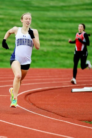 Seen running with a comfortable lead late in the 800-meters run in a meet in Chillicothe on March 30, Brookfield High School junior Alexandra "Alex" Sharp swept the 800, 1,600, and 3,200 races in last Tuesday's Gerald Mansfield Invitational/Macon Open track-and-field meet. She was the meet's top girls' points scorer.
