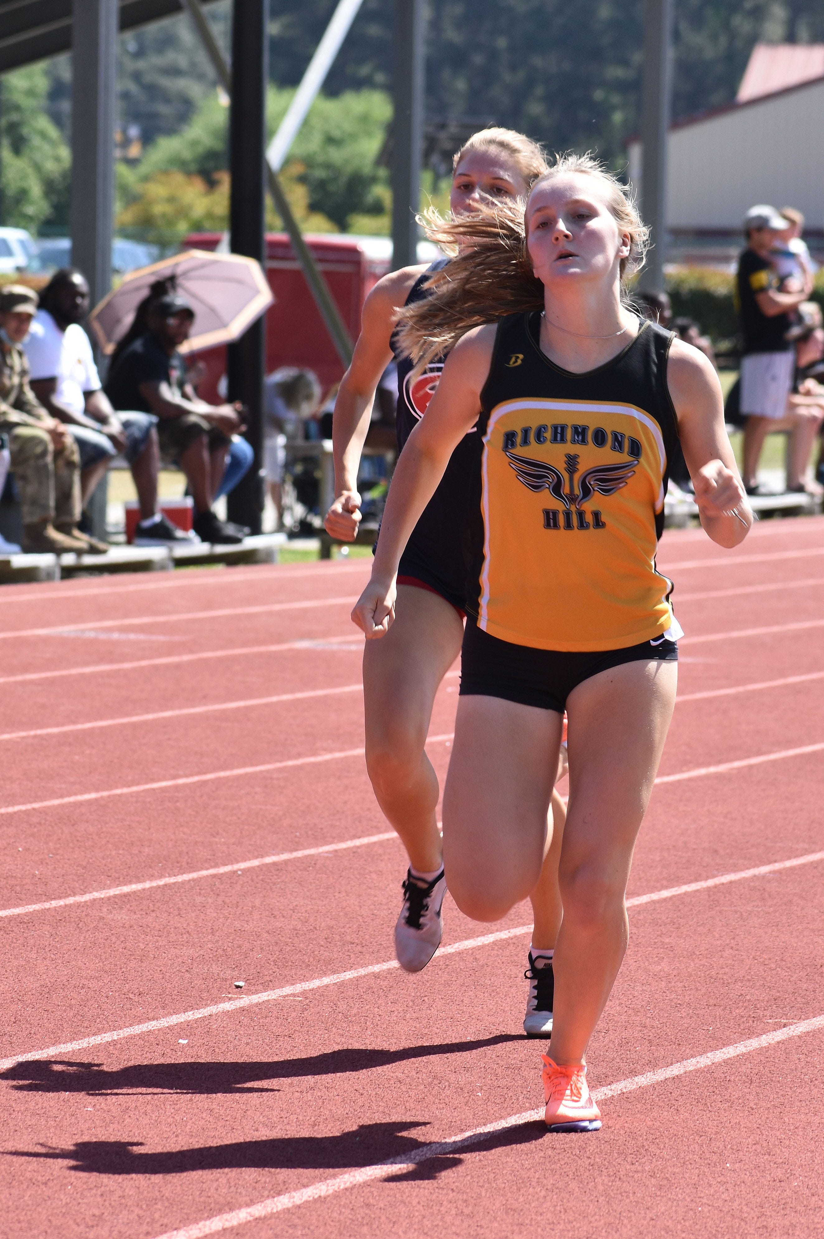 Richmond Hill High School track and field standout Lucy Tuttle wins