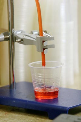 A liquid dose of methadone is measured out at a Northern Kentucky clinic. Methadone is a medication used to stabilize patients with opioid use disorder and reduce their cravings.