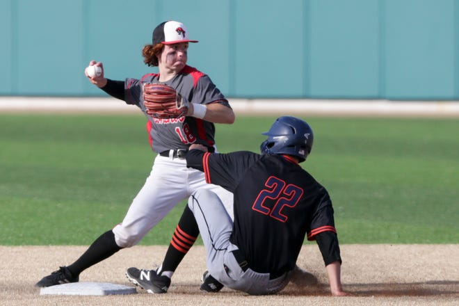 Lafayette Jeff's Adram Ritchie (18) moves to throw to first after Harrison's Will Isom (22) slid into second during the third inning of an IHSAA baseball game, Tuesday, April 27, 2021 in Lafayette.