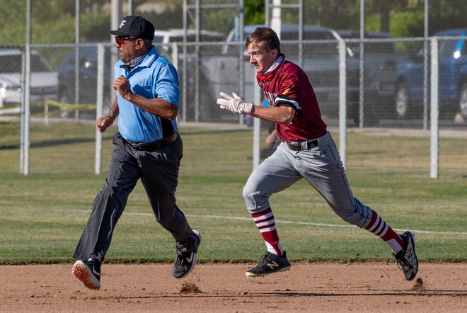 Mt. Whitney's Parker Westmoreland runs to second on an El Diamante error in a West Yosemite League high school baseball game Tuesday, April 27, 2021.