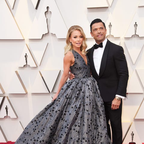 Kelly Ripa and Mark Consuelos attend the 91st Annu