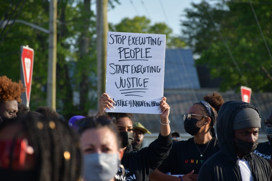 Demonstrators gather in Elizabeth City, N.C., on Tuesday to demand accountability and justice after sheriff's deputies fatally shot Andrew Brown Jr. last week.