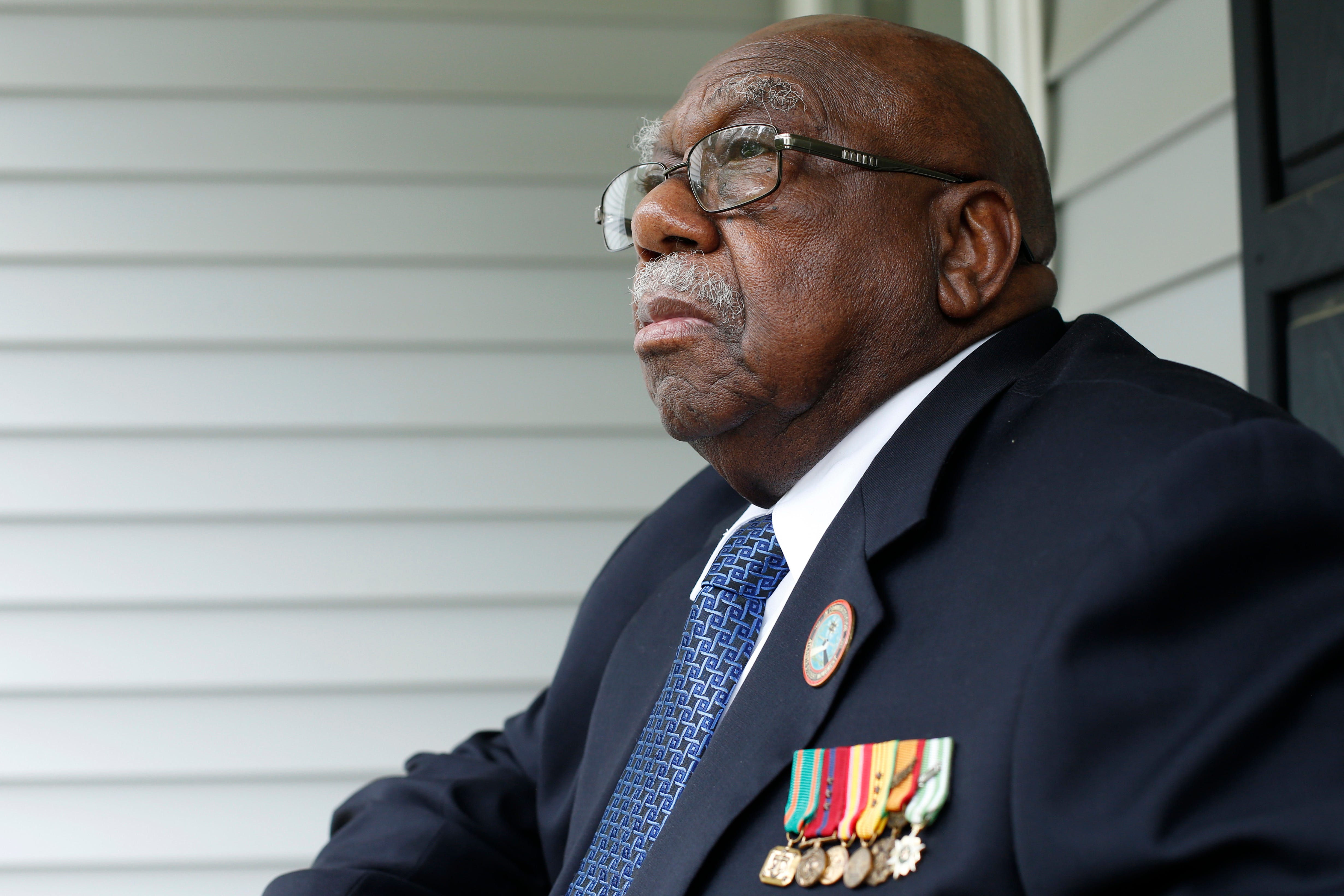 Charles Person, one of the original 13 Freedom Riders, on his front porch at his Atlanta home on April 29, 2021.