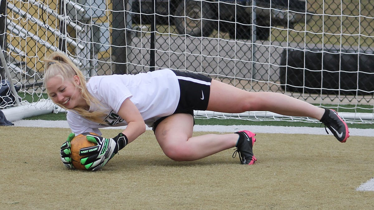 First-year soccer player Sydney Hatley has thrived in net, been great example for Alma girls