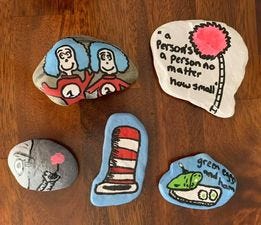 A group of Abigail Adams Middle Schools assisted "Weymouth Rocks' by painting kind messages on stones that have been placed in various town parks