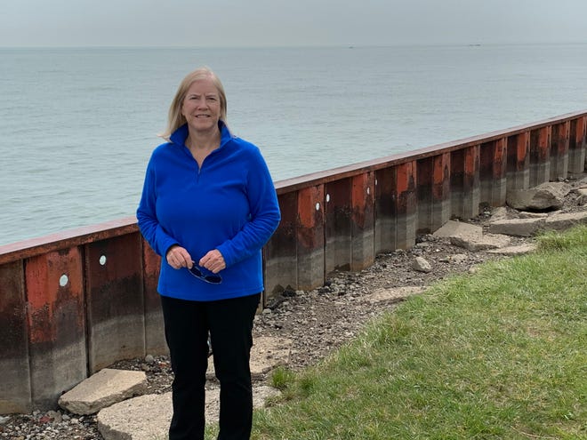 Candice Miller, Macomb County Public Works Commissioner, stands beside Lake St. Clair near an outlet for combined sewage overflows at the county's Chapaton Pump Station in St. Clair Shores, on April 27, 2021. (Provided by Macomb County.)