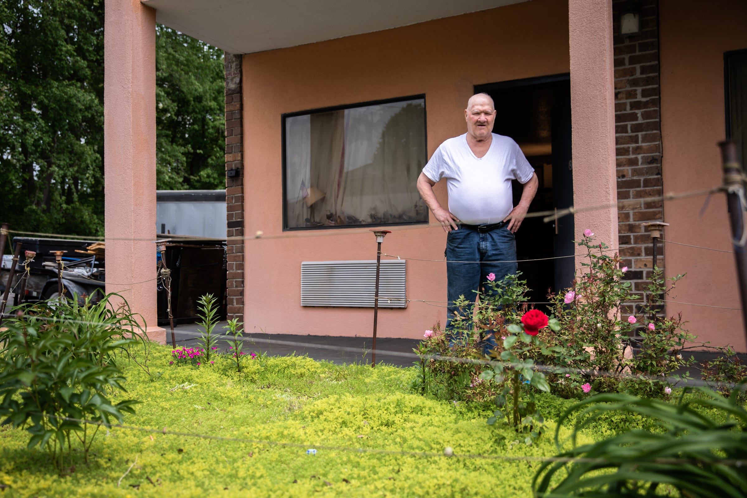 Alan Byrd, 76, with his garden at his room at the Travelers Inn in Greenville, Friday, April 23, 2021, where he has lived for the past 15 years.