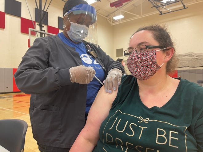 Though the vaccine clinic at Marion Harding High School was geared towards getting young adults vaccinated, it was also open to members of the public. Aubrey Yost used this opportunity to receive her first dose of the Pfizer vaccine.