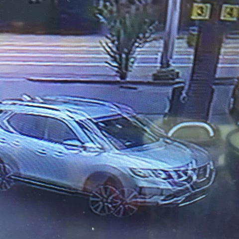 A surveillance image of the stolen Nissan Rogue th