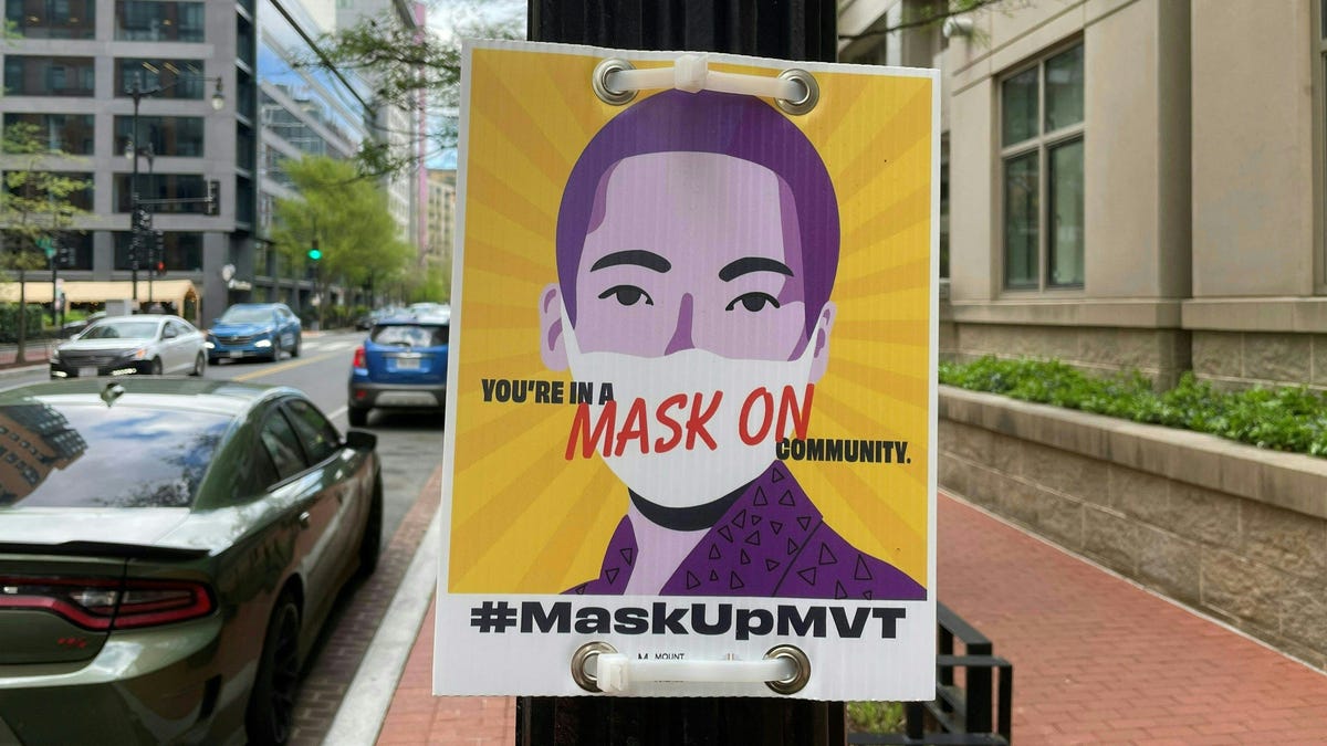 A sign encouraging the use of face coverings in Washington, DC on April 16, 2021.