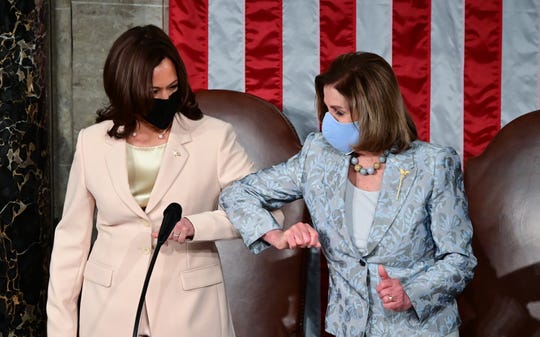 U.S. Vice President Kamala Harris (L) greets Speaker of the United States House of Representatives Nancy Pelosi (D-CA) ahead of U.S. President Joe Biden addressing a joint session of Congress in the House chamber of the U.S. Capitol April 28, 2021 in Washington, DC.