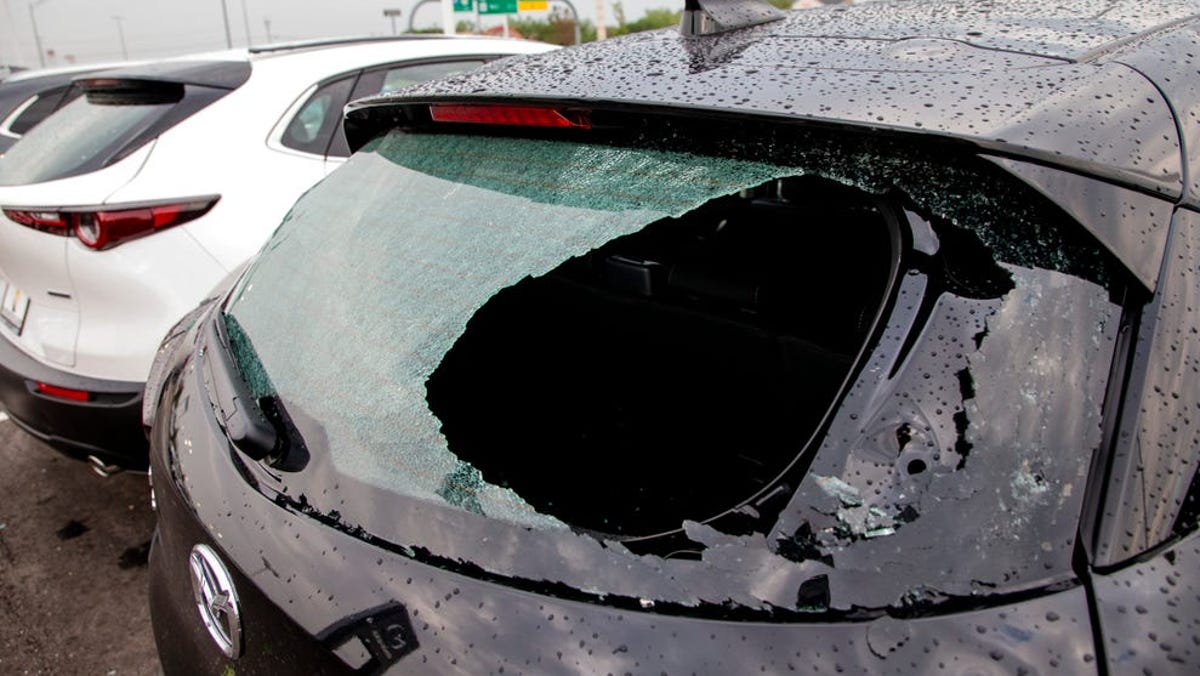 Storm damage to cars in Norman, Okla on Thursday, April 29, 2021, after a hail storm hit the area Wednesday evening..