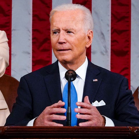 President Joe Biden is pictured addressing a joint
