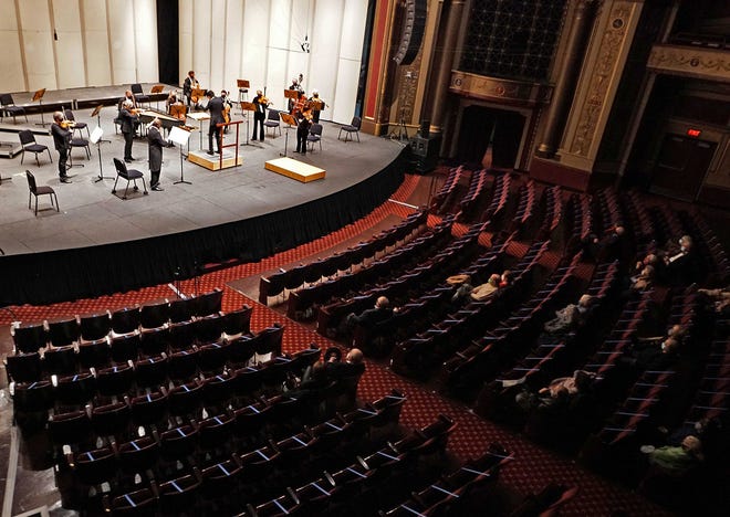 The Rhode Island Philharmonic plays in front of a socially distanced crowd, with seating limited to 125, at Veterans Memorial Auditorium in November.