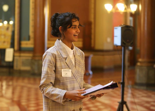 Shreya Khullar, a junior at Iowa City West High School in Iowa City, Iowa, delivers a poem after being inaugurated as Iowa's first student poet ambassador during a ceremony at the Iowa Capitol Building rotunda in Des Moines, Iowa, on Friday, April 30, 2021.
