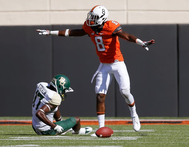 Oklahoma State's Rodarius Williams (8) was drafted by the New York Giants in the sixth round of the NFL Draft on Saturday.