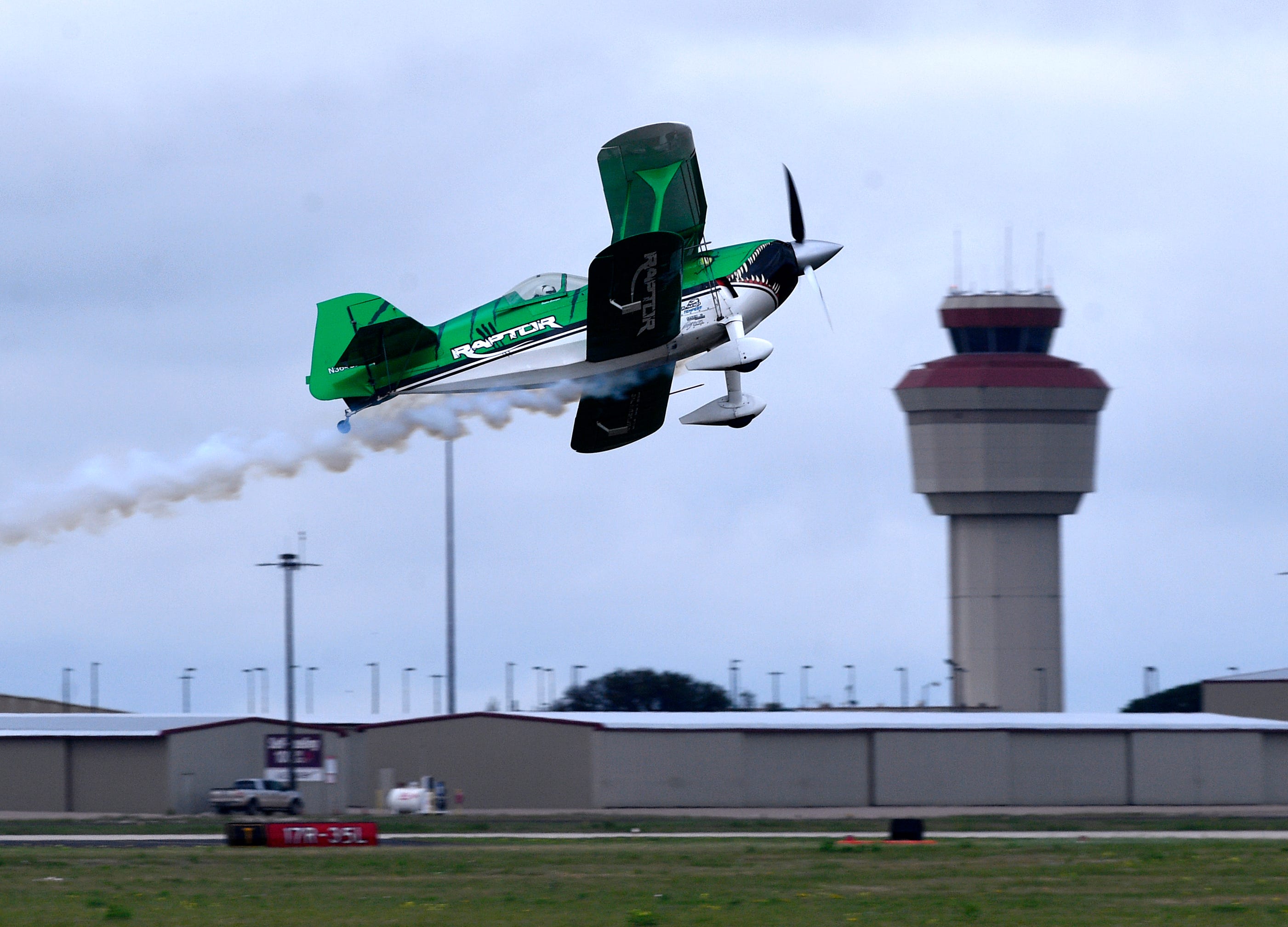 Planes, visitors swoop between raindrops at AirFest 2021