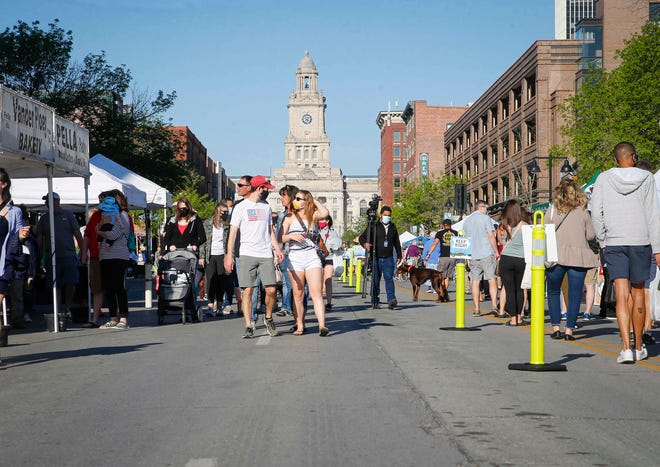 The Downtown Des Moines Farmers' Market opened the 2021 season on Saturday, May 1, 2021 with new COVID-19 restrictions including one-way foot traffic, limited vendors and hand sanitizer stations.