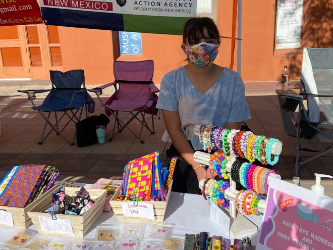 Elise Craig, 11, makes slap bracelets, bags and bows using duct tape, which she sells at the Las Cruces Farmers and Crafts Market. "I like wearing bracelets so I started making my own," the fifth-grader at Sonoma Elementary said.