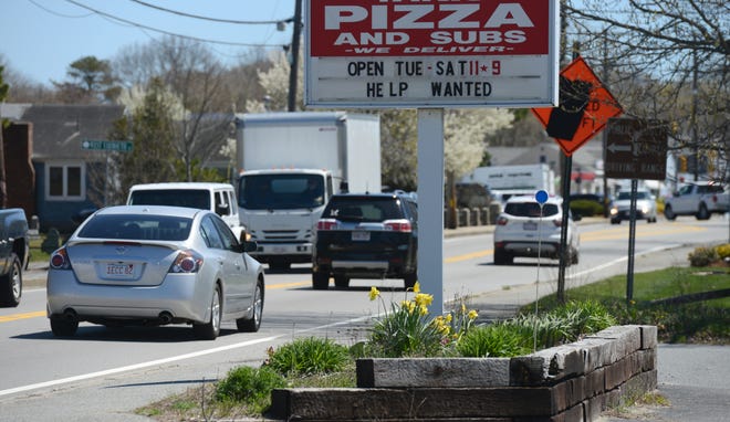 Help wanted signs such as this one on Route 28 in West Yarmouth can be seen all around the Cape, as businesses struggle to find workers as the summer season approaches.