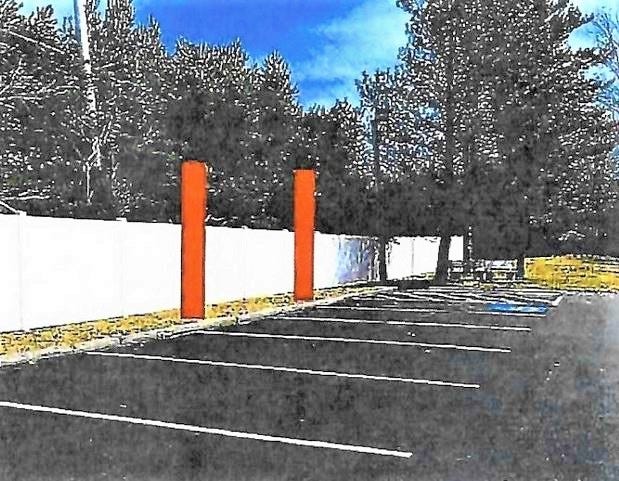 This rendering shows where four electric car charging stations will be installed behind Aurora Memorial Library.