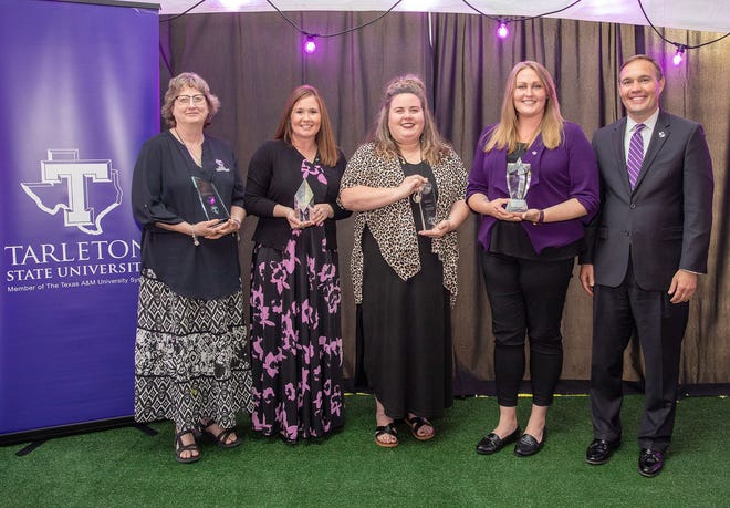 Tarleton State University presented its annual Staff Awards on April 19 during a dinner to celebrate the 2020 and 2021 recipients. Pictured are, from left, 2020 recipients Julie Phillips, Jo Anna Ince, Callie Fender, Lauren Gillespie and President James Hurley.