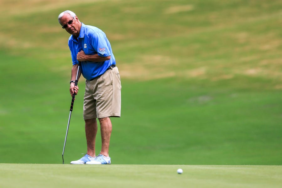 Retired UNC basketball coach Roy Williams tees off with Mack Brown at Quail Hollow Club