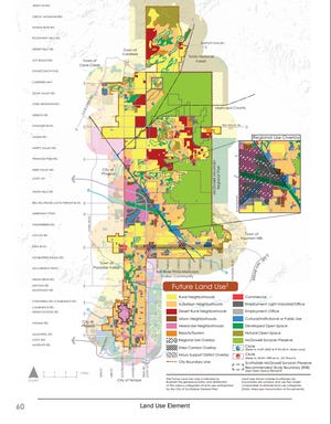 City Council discussed creating a new land use in north Scottsdale, named Desert Rural Neighborhoods, identified in red in the map. After the State Land Department objected to a proposal, the council decided to strike the proposal from a plan aimed at guiding city growth.