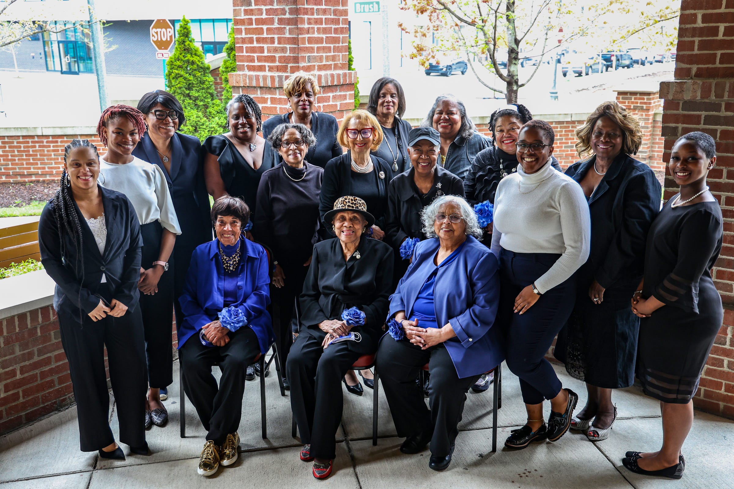Members of the Elliottorian Business and Professional Women's Club and Jessie P. Slaton scholarship recipients  pose for a photo at the Village of Brush Park Manor Paradise Valley in Detroit on April 29, 2021.  The Elliottorian Business and Professional Women's Club is the first club of Black business women in Detroit and Michigan and was founded in 1928.