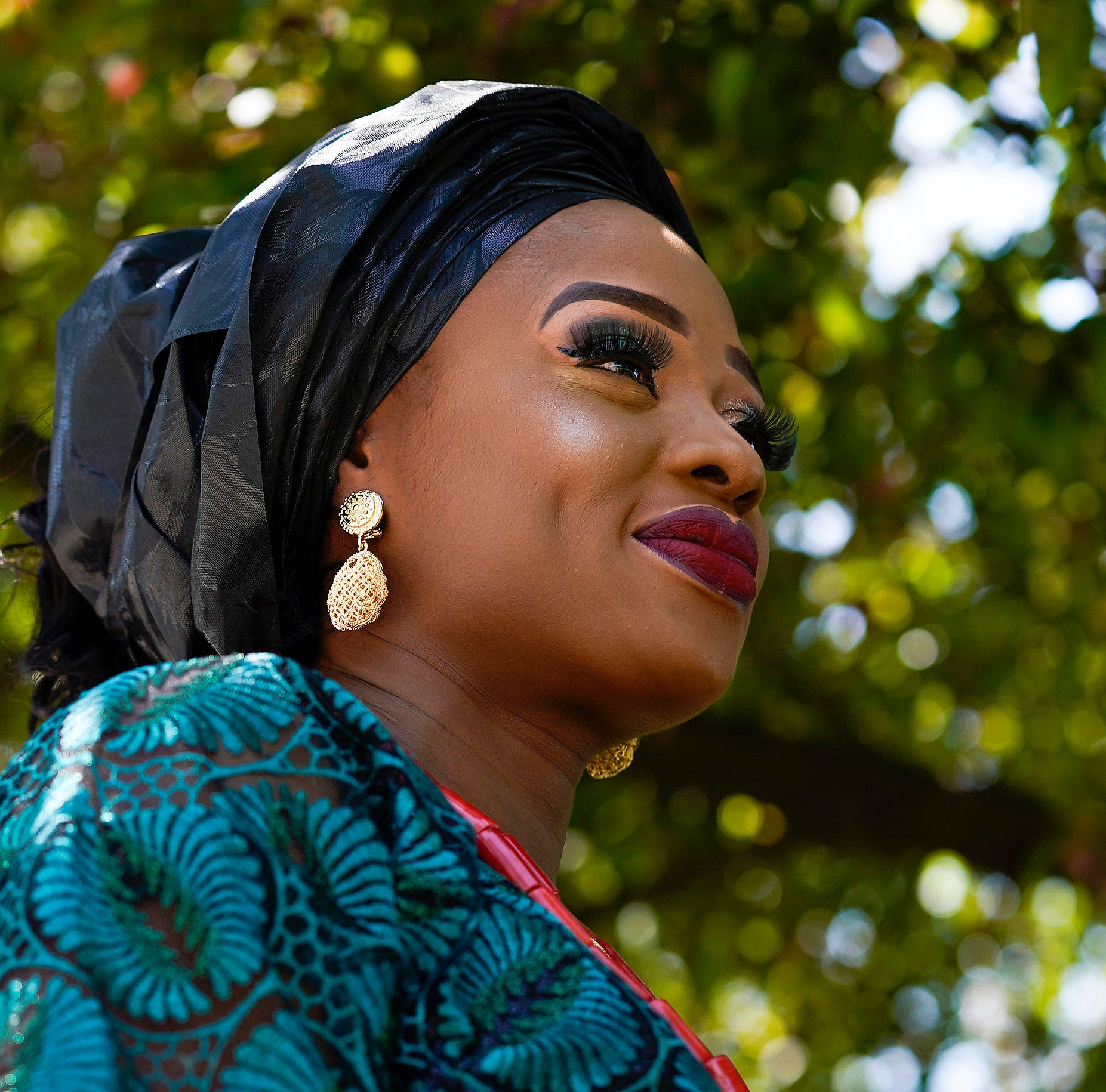 Omobola Afolayan, 40, is a protector. Afolayan moved to Indianapolis from Nigeria in 2019 with her husband and two sons, now 9 and 12, to live a life without persecution. Her family is Christian and with the rise of Boko Haram, an Islamist group that has killed thousands of people and displaced millions, Omobola made the decision to come to the United States to find safety and peace. Afolayan poses for a portrait, Tuesday, April 27, 2021, outside her home in Indianapolis. Omobola's mother said women are nation builders. ÒWhen you have freedom,Ó Afolayan said, Òappreciate it.Ó