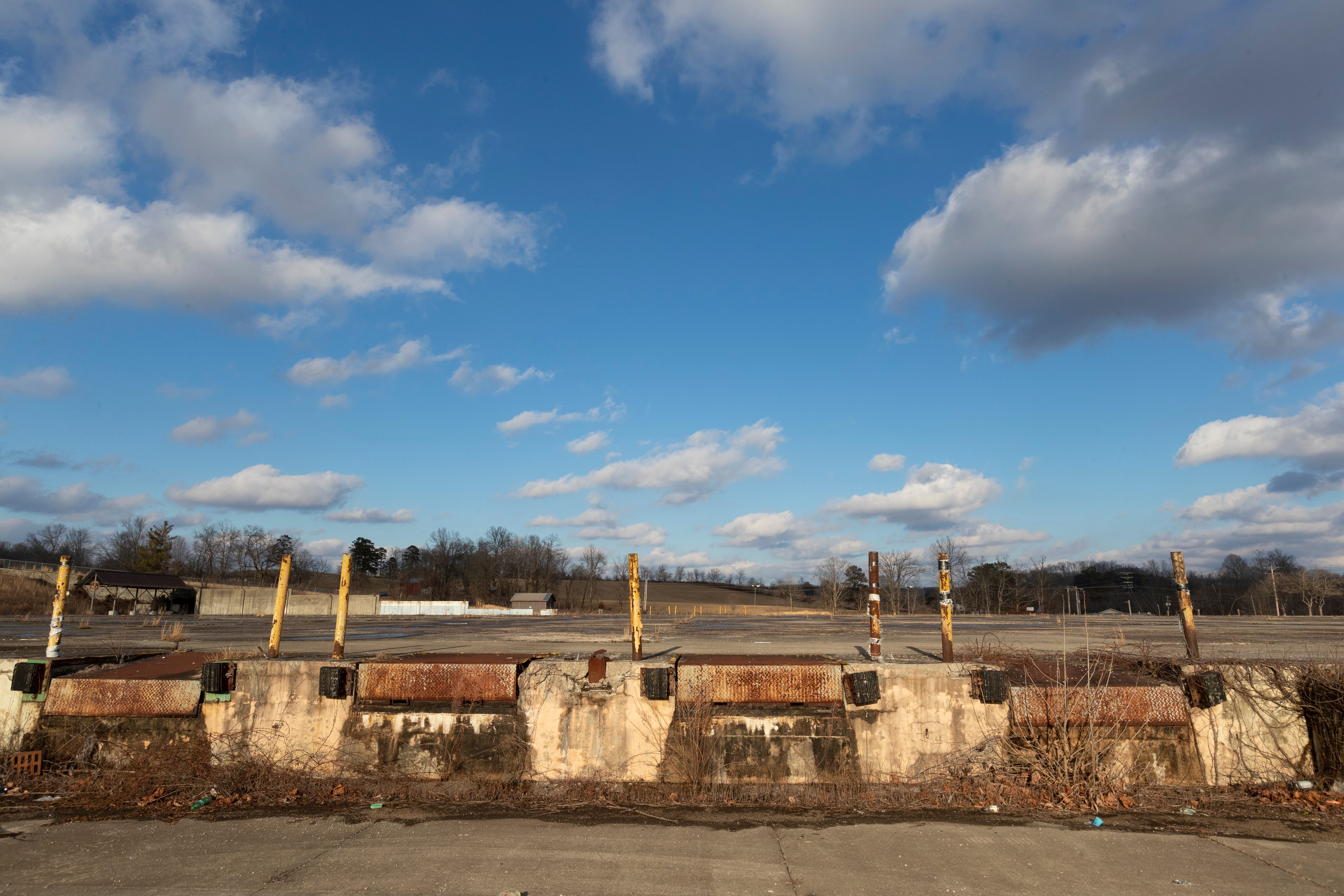 An empty lot marks the site of what was a Mid-South Electronics plant in Annville, Kentucky. The plant was destroyed in a 2005 fire which left about 700 people out of work. What was a child care center in the industrial park is now a Teleworks USA hub that provides training for customer service jobs for national retail chains and other companies.