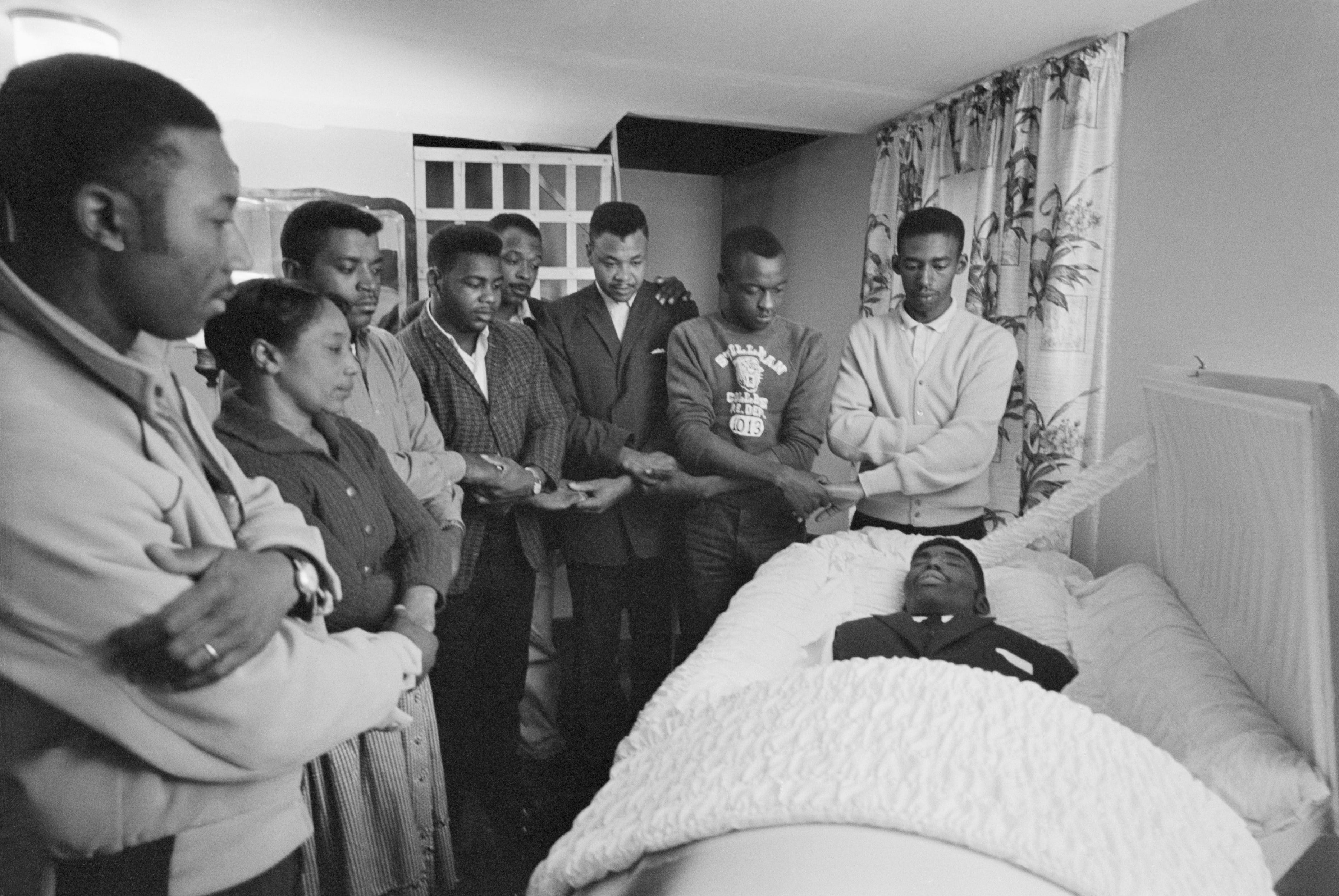 Mourners gather near the body of Jimmie Lee Jackson, who died days after being shot on Feb. 18, 1965, by an Alabama state trooper during a civil rights protest in Marion, Alabama. As this photo is from an archive, names of the mourners are not available.