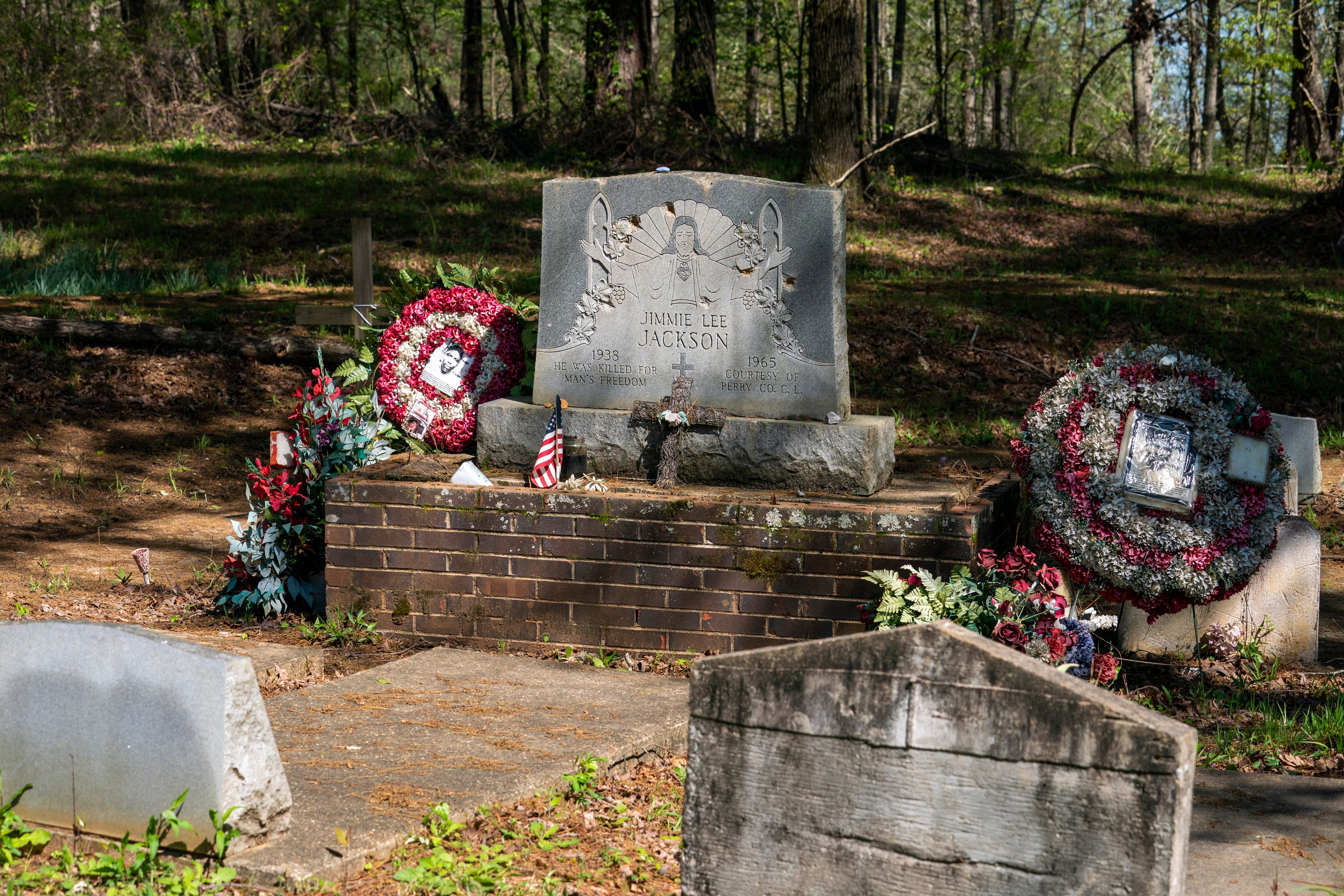 The gravesite of Jimmie Lee Jackson in Marion, Alabama is adorned with tributes to his fateful death.