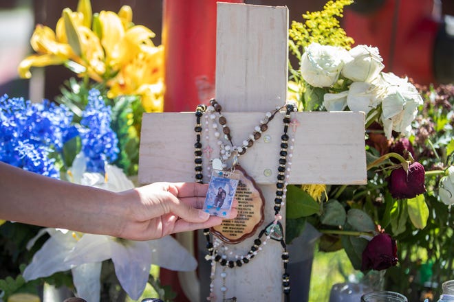 Neighbors and others who knew Juan Cruz made a shrine this month to remember the 15-year-old, who Austin police say was fatally shot in an encounter with a neighbor and her boyfriend in North Austin.