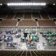 Maricopa County ballots from the 2020 general election are examined and recounted by contractors hired by the Arizona Senate, May 5, 2021, at the Veterans Memorial Coliseum, Phoenix.
