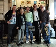 Pete Gitlin, far left, with the Pita Jungle Jazz Jam house band in Chandler.