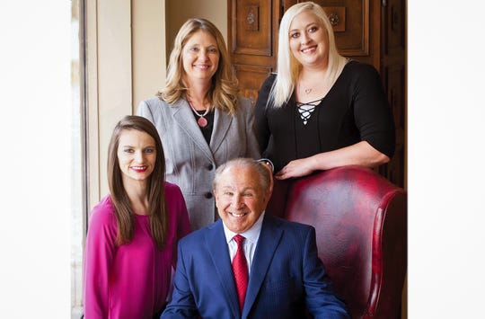 Lawyer David Greene and his staff from left, Jessica Costlow, Tara Brown and Victoria Mayfield.